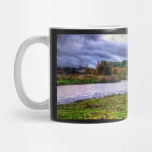 Narrow Boat moored on the river Mug